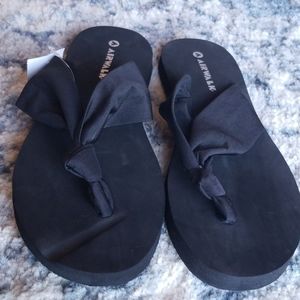 Black flip flops